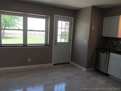 another angle of kitchen , new tile floors