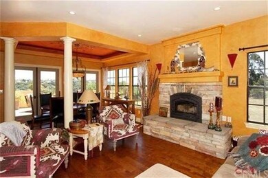 Upstairs family room with wood burning fireplace, 