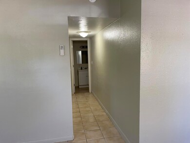 Hallway to bathroom