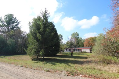 House and Clearing From Road