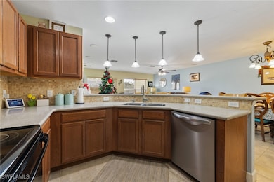 Kitchen with dishwasher, black range with electric