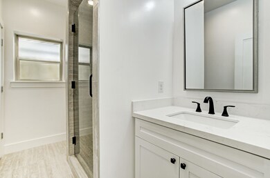 1st floor bathroom with a beautiful shower and qua