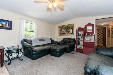 LIving Room and Hall to Guest Bedrooms