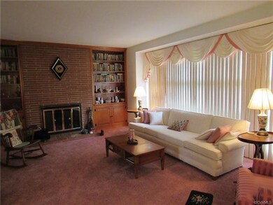 Fireplace flanked by built-ins