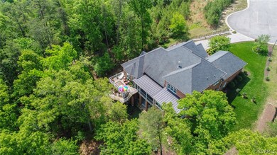 The house is located on a cul-de-sac. There is an irrigation system with separate water meter to maintain the yard.