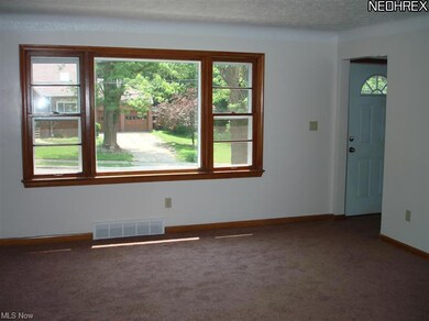 Spacious Livingroom boasts new paint and new carpe