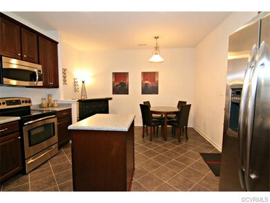 Kitchen- pendant light and access to the garage.