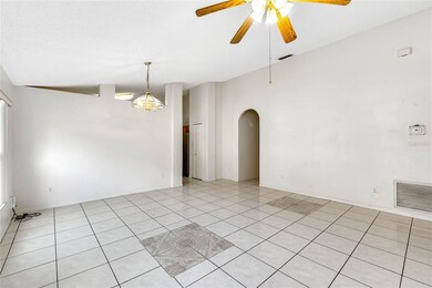 The angled ceiling keeps the space light and airy