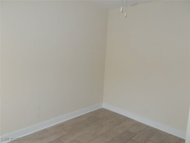 Unfurnished room with light wood-style flooring an