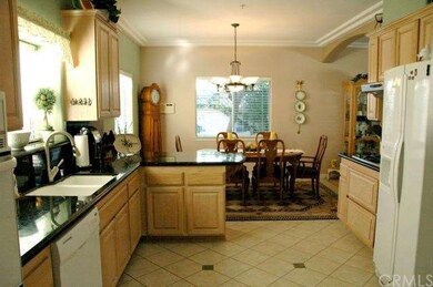 View from large open kitchen towards dining room. 