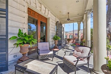 Recessed lighting and ceiling fans make porch usable