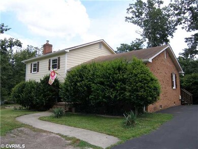 Exterior Front - Brick/Hardboard Siding,Paved Driv
