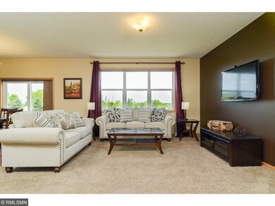 Living room featuring large picture window for ple
