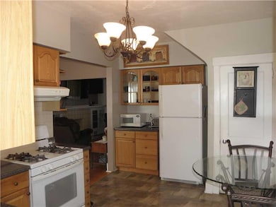 Kitchen. Stunning Porcelain Tile Floors in Updated