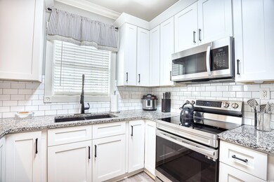 Kitchen featuring appliances with stainless steel 