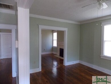FROM PARLOR LOOKING INTO DINING ROOM.