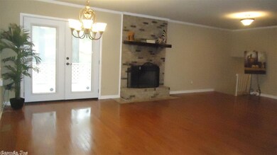 Living Room/Dining Room with Woodburning Fireplace
