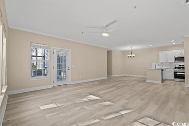 Unfurnished living room with a chandelier, baseboards, light wood-type flooring, ceiling fan, and a sink