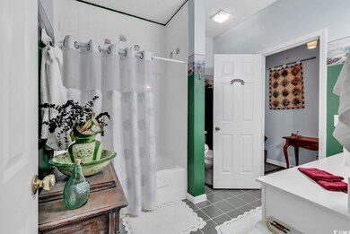 Full bathroom with vanity, shower / bathtub combin