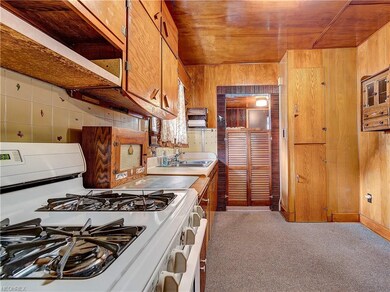 * KITCHEN WITH GAS STOVE AND PANTRY - ALSO BEHIND 