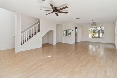 Unfurnished living room with visible vents, ceili