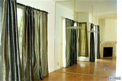 SEPARATE DINING AREA ITH MIRRORED WALL AND SLIDING