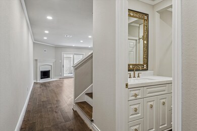 Foyer boasts engineered HW floors with glimpse of