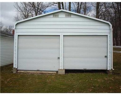 Parking Lot/Garage. Additional 2 stall carport