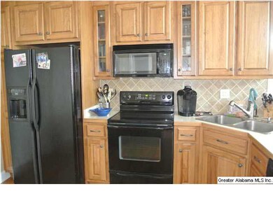 KITCHEN WITH TILE BACKSPLASH