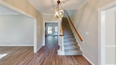 Right inside the front door - home office to the l