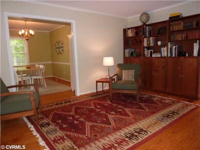 Living Room - Gleaning hardwood floors highlight t
