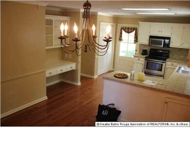 kitchen, desk, and dining area