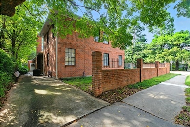 Calhoun St. view with additional driveway