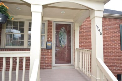 The inviting covered front porch welcomes friends 