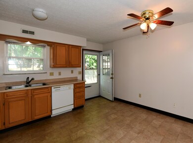 Kitchen with door to patio