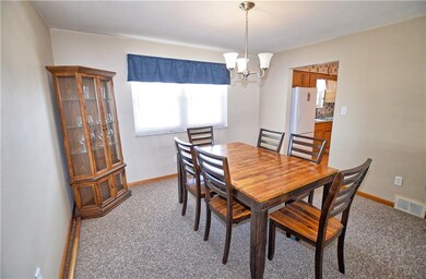 Bright dining room with plenty of space for a larg