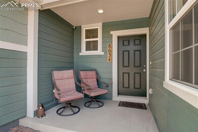 View of exterior entry featuring a porch