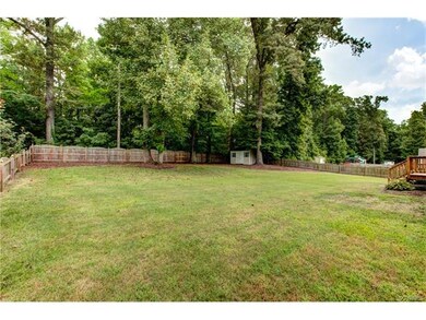 HUUUGE fully fenced back yard, Scalloped walls wit