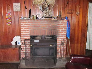 Other. Wood stove w/ brick hearth