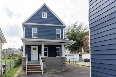 1464 E 123rd St, Cleveland, OH 44106 - photo 2