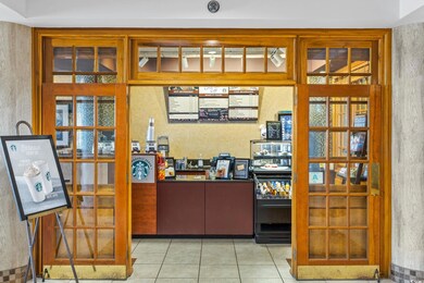 Office with light tile patterned flooring
