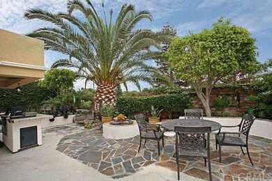 Lust trees offer privacy in the tranquil backyard.