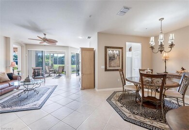 Dining room featuring ceiling fan with notable cha