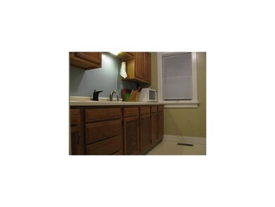 Kitchen. Lots of cabinets.