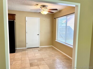 Dining area at end of kitchen w/ lots of natural l