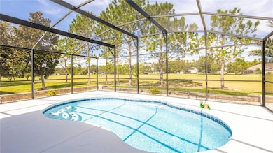 Screened-in pool overlooking the 10th hole