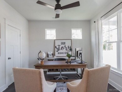The entry offers an office w/ glass French doors,