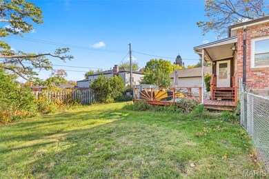 View of yard featuring a wooden deck
