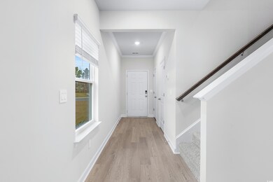 Corridor featuring light hardwood / wood-style flo
