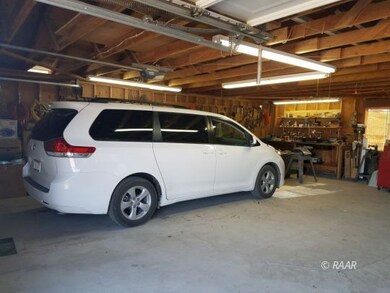 INSIDE 3 CAR GARAGE